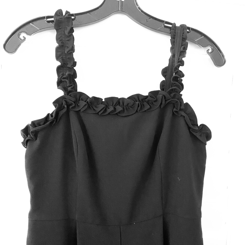 Black jumpsuit with ruffled trim